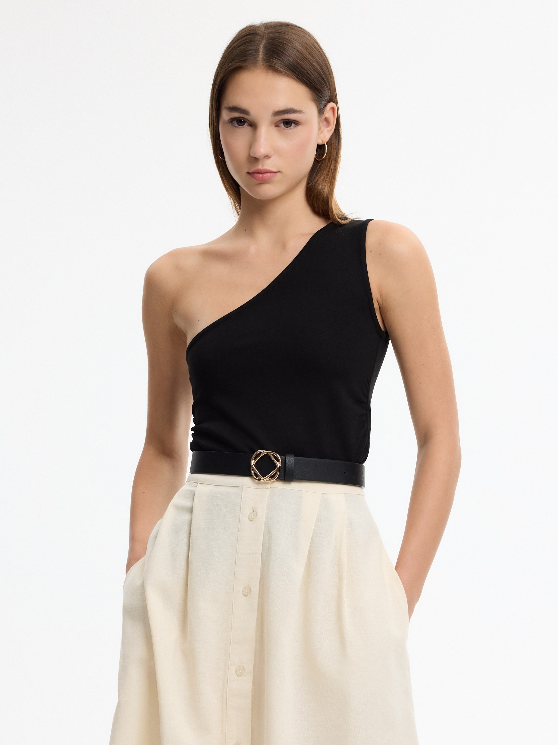 Slim asymmetrical draped top black middle front view