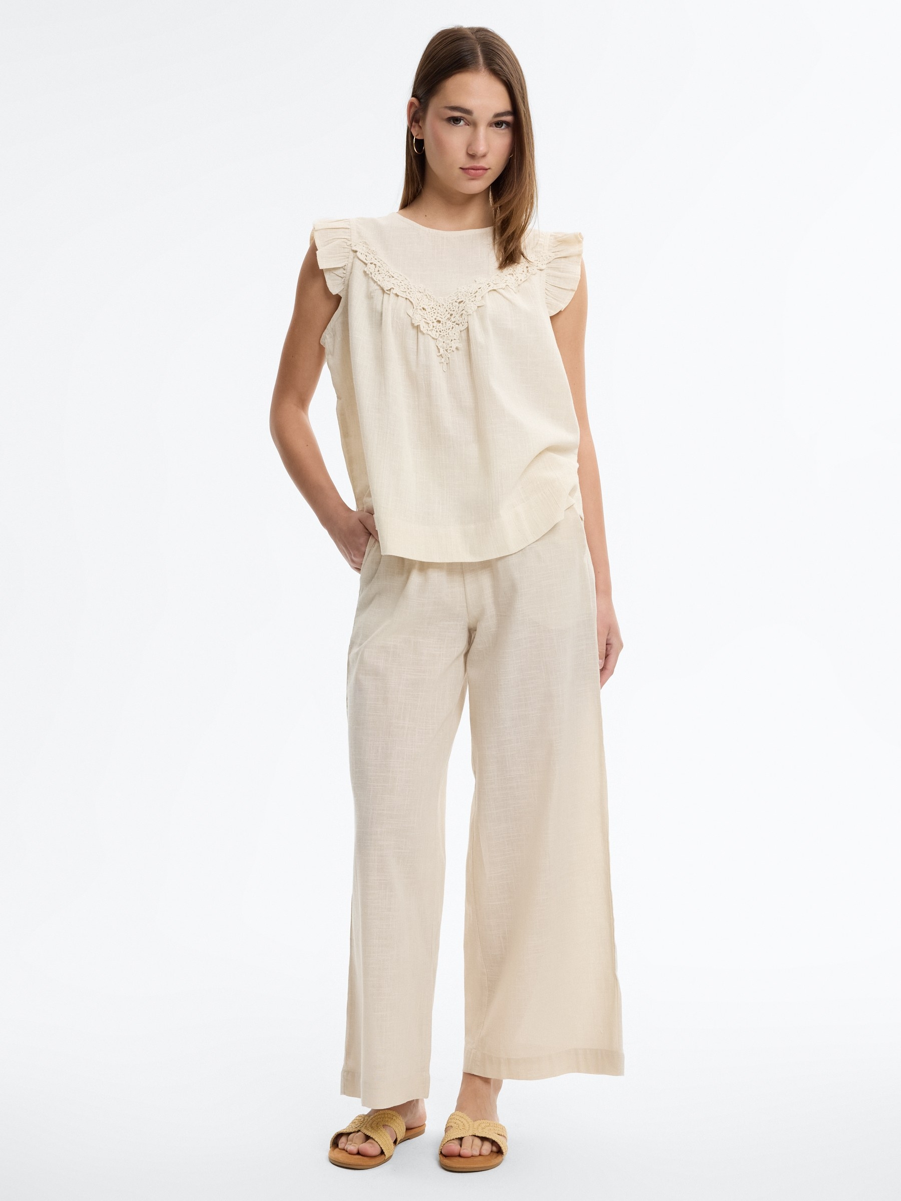 Pantalón palazzo lino elástico blanco roto vista general frontal