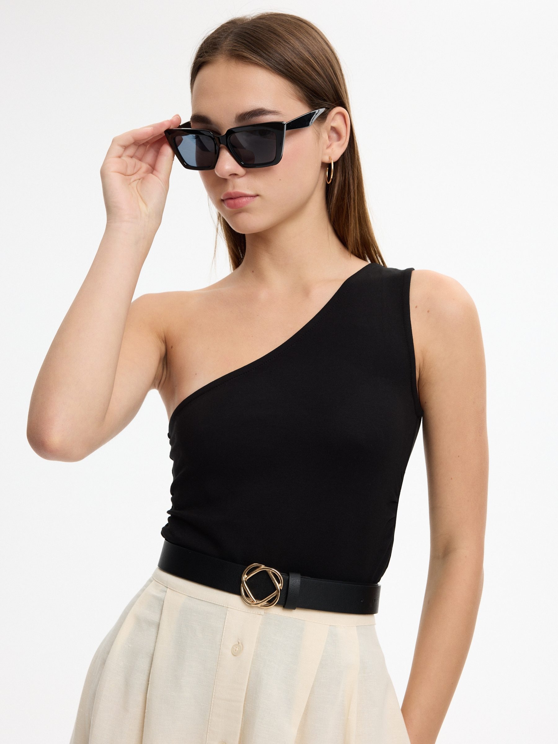 Slim asymmetrical draped top black middle front view