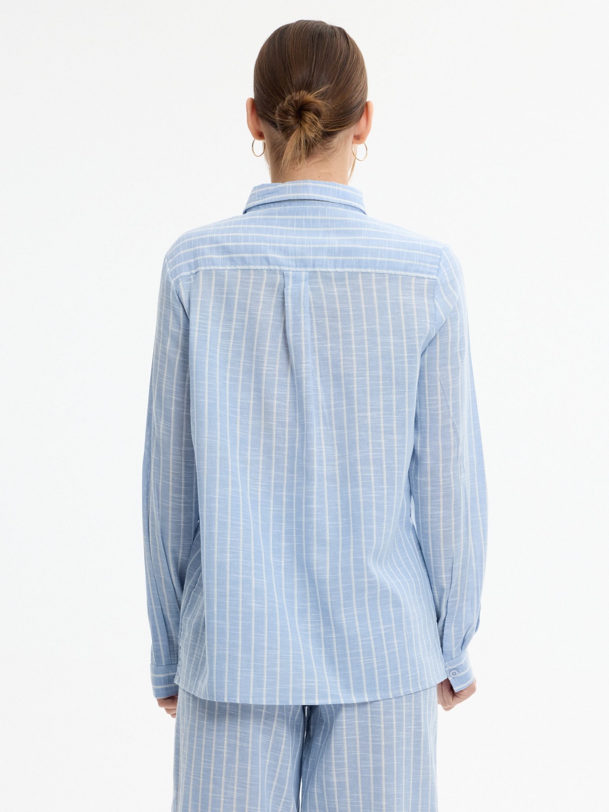 Oversized striped shirt sky blue middle back view