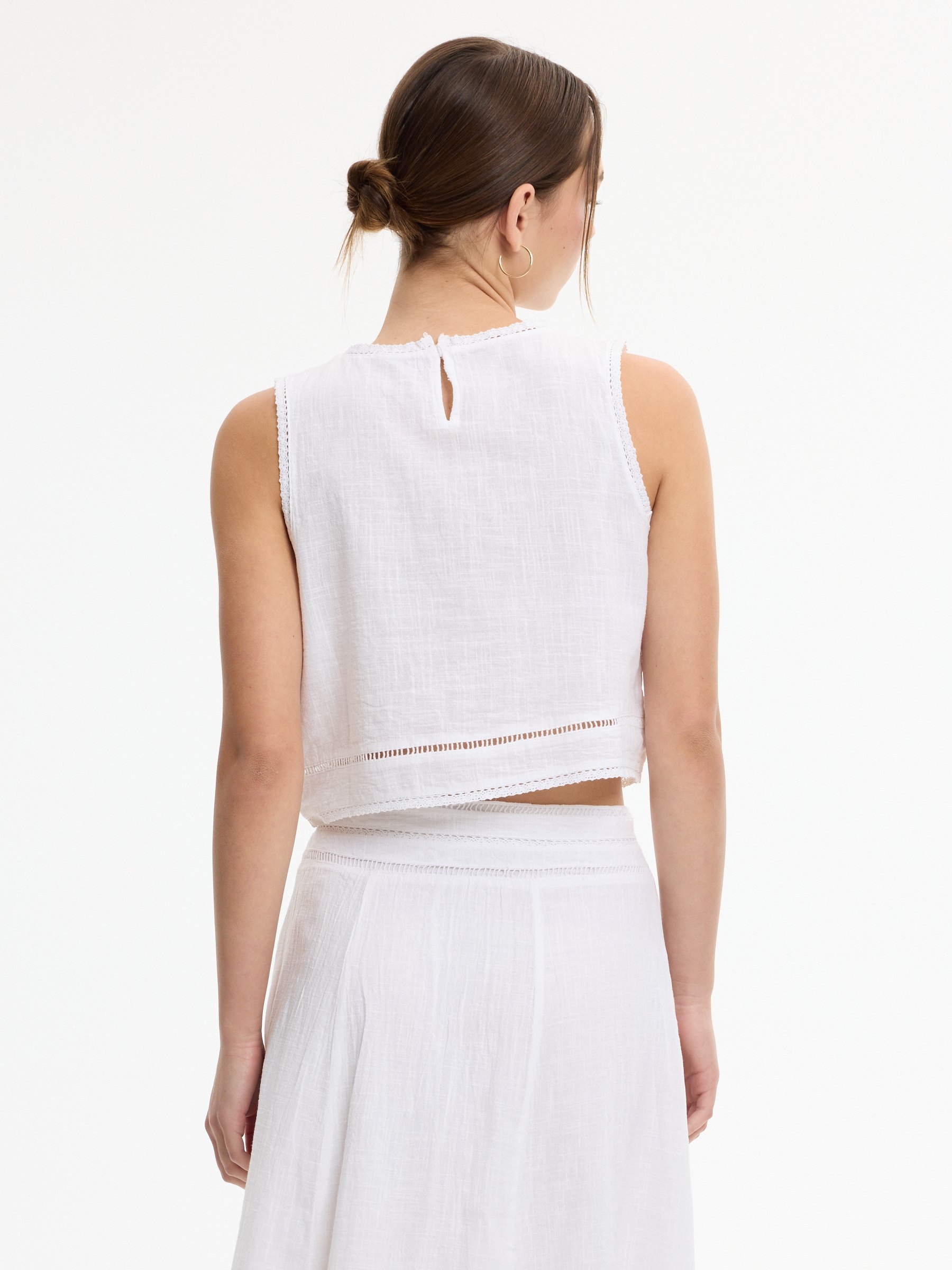 Embroidered top white middle front view