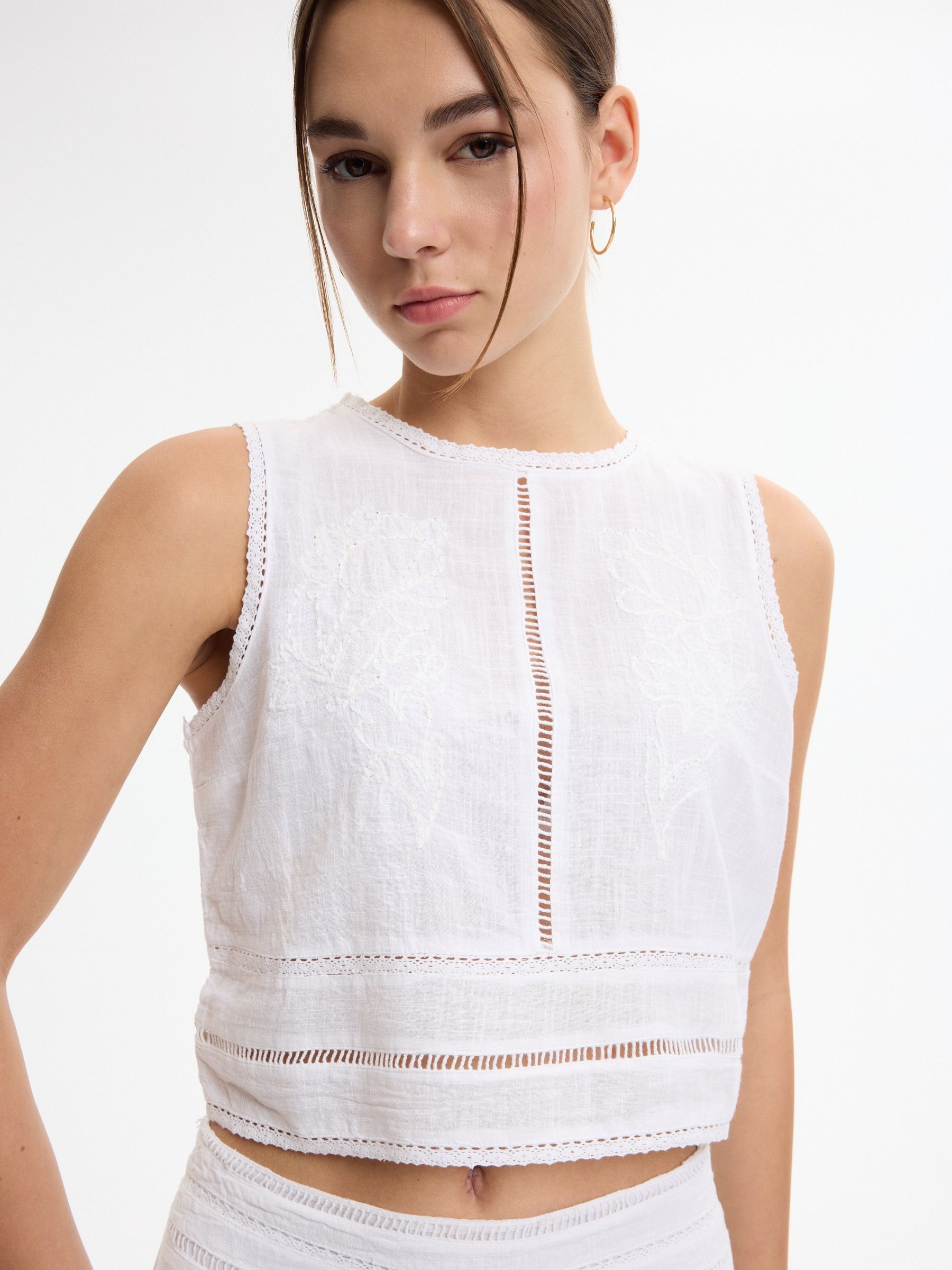 Embroidered top white middle front view