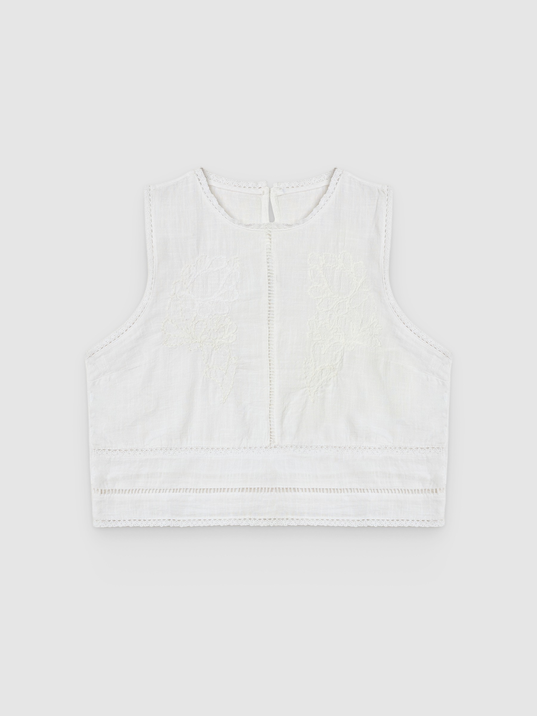 Embroidered top white middle front view
