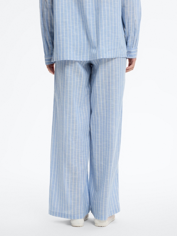 High-waisted striped wide-leg pants sky blue middle back view