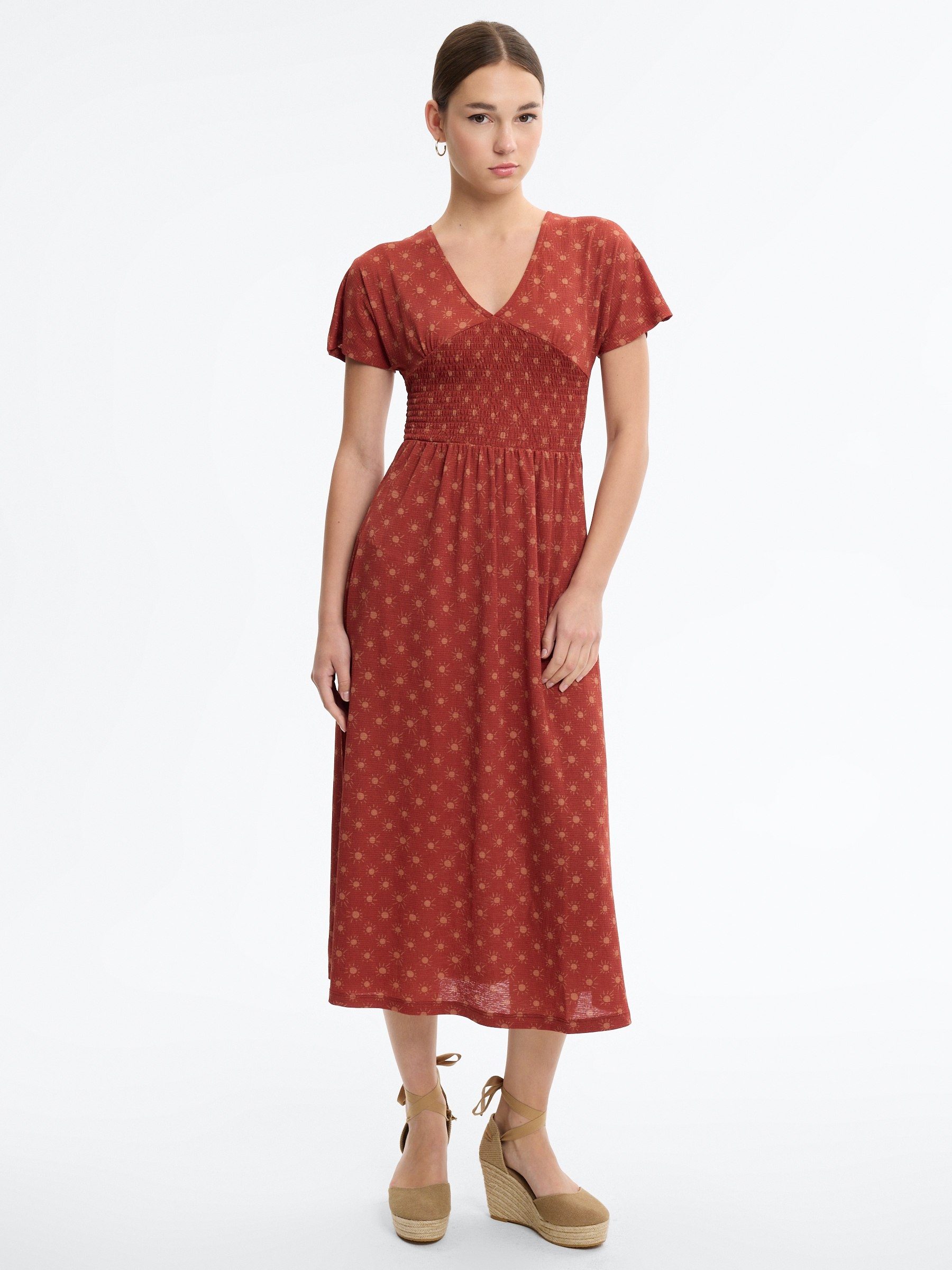Printed smocked midi dress brick red middle front view