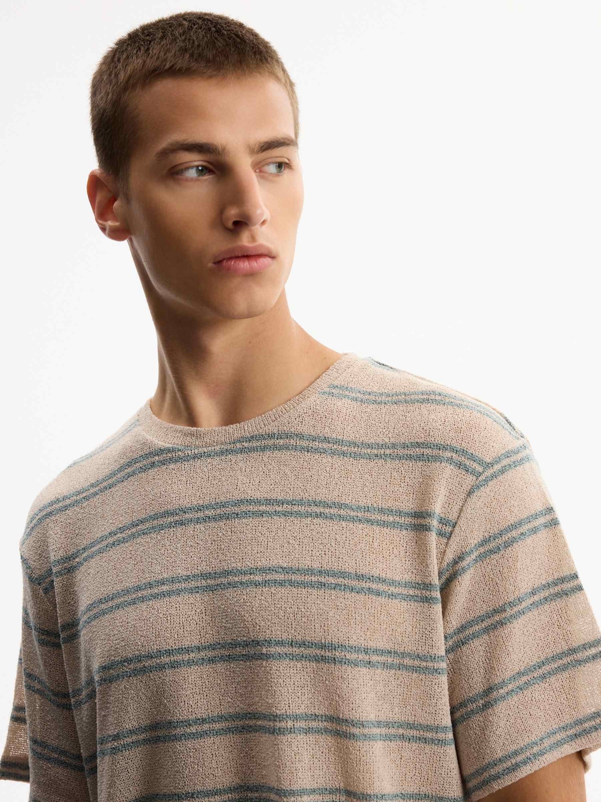Oversized striped knit T-shirt raw detail view