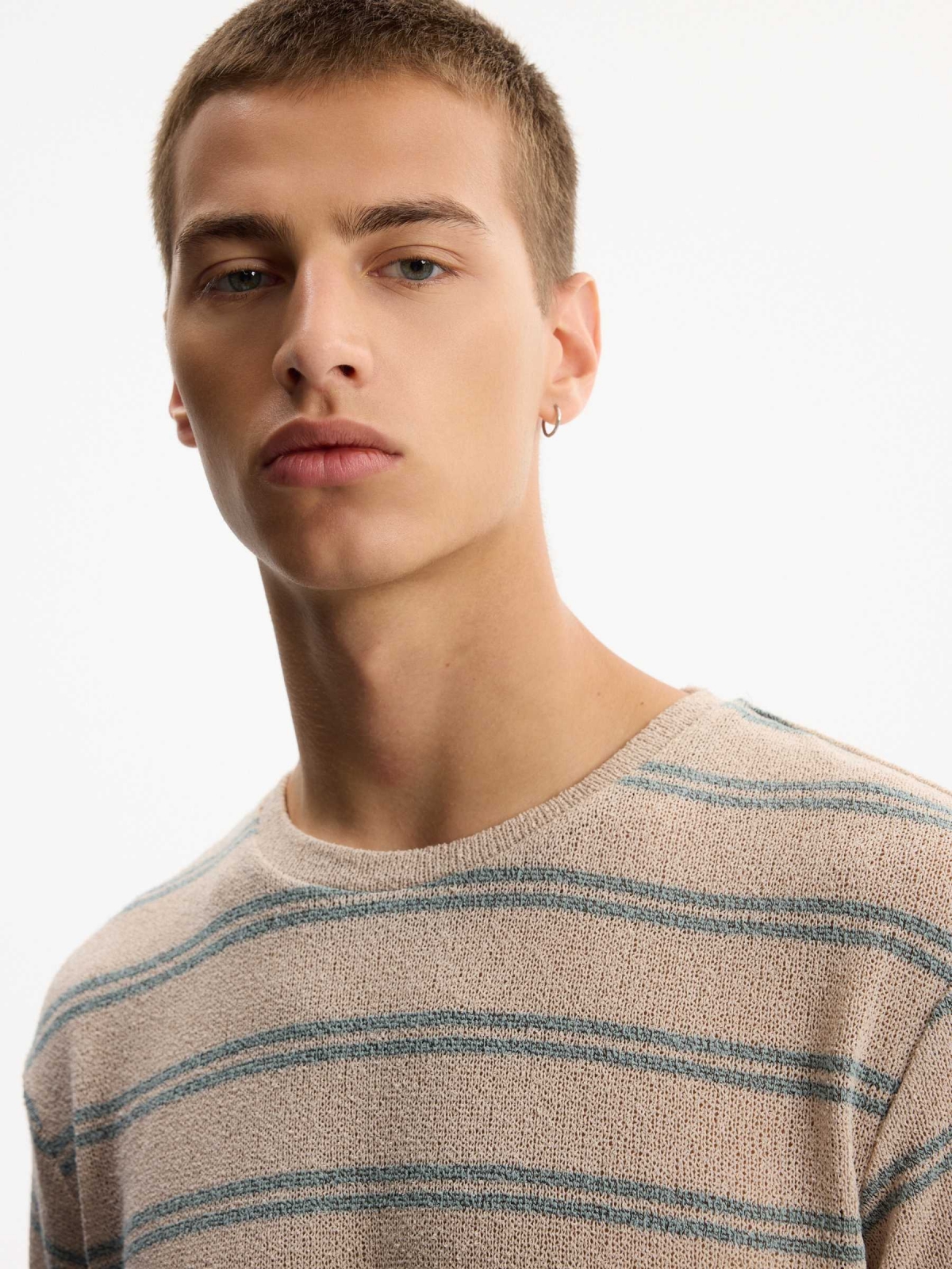 Oversized striped knit T-shirt raw detail view