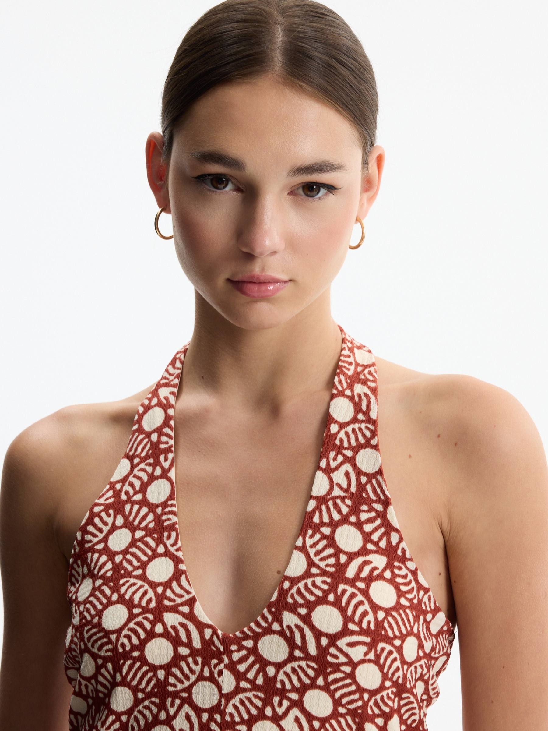 Macacão halter estampado slim marrom vista meia frontal