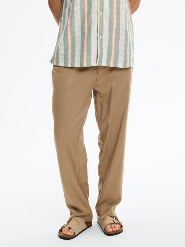 High-waisted linen joggers beige middle front view