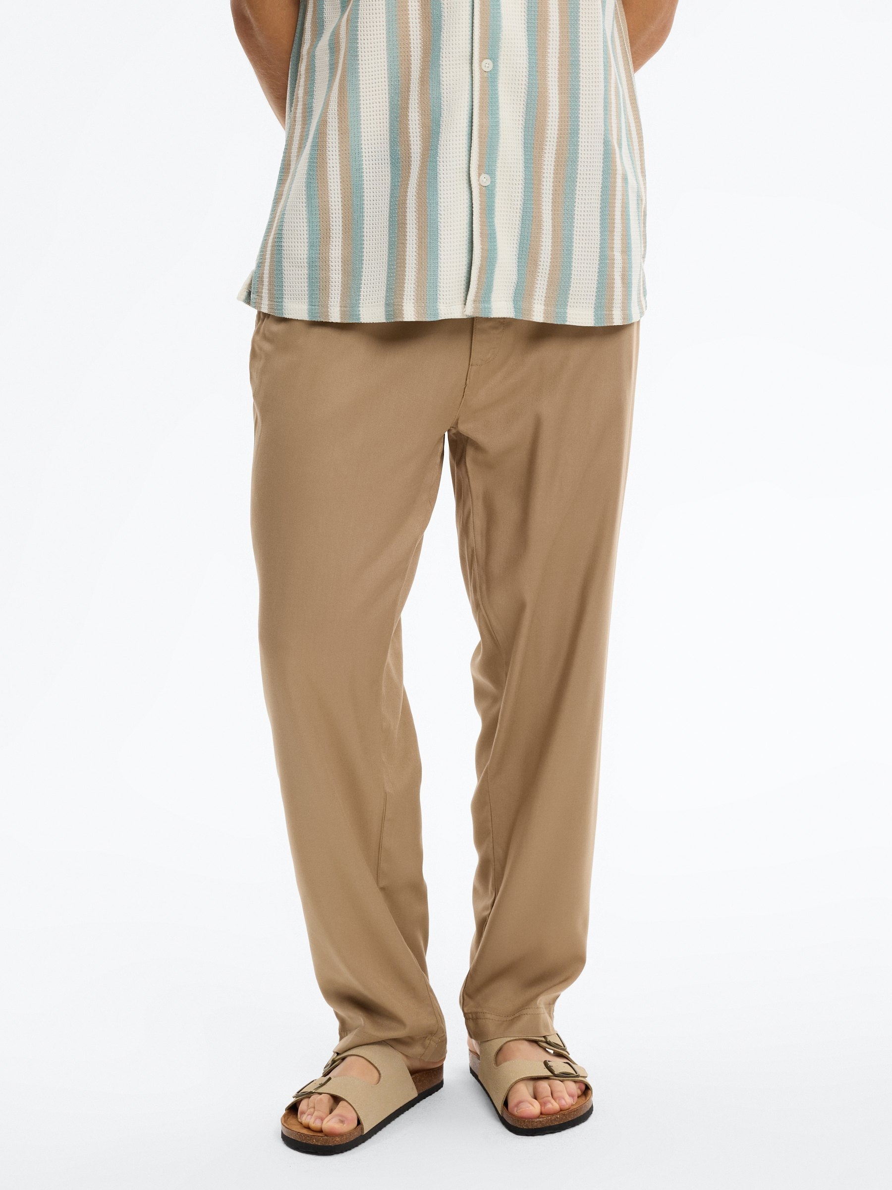  High-waisted linen joggers beige front view