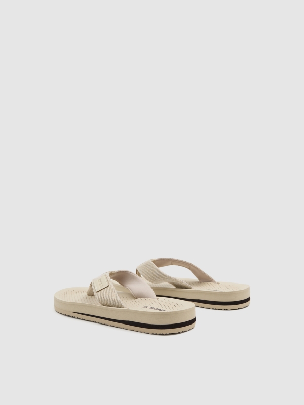 Toe-post sandal with faux leather straps beige 45º back view