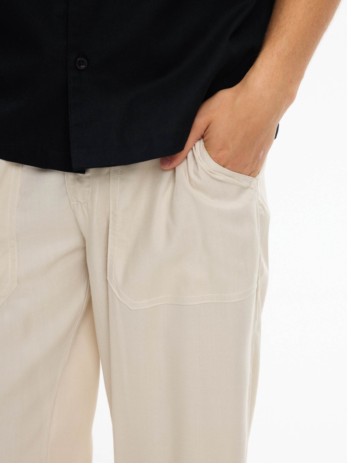 Linen joggers with elastic waistband raw detail view