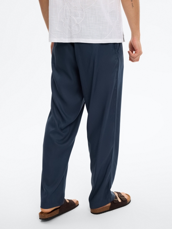 High-waisted linen joggers navy middle back view