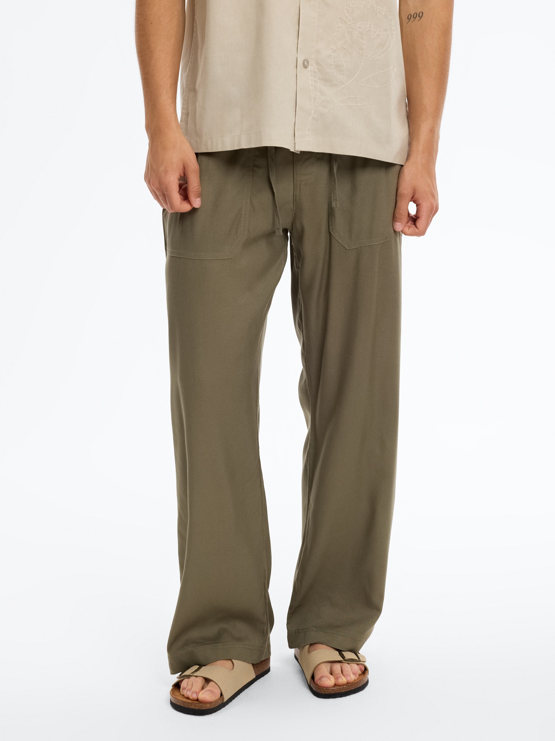 Jogger de linho com cintura elástica cáqui vista geral frontal