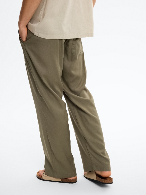 Linen joggers with elastic waistband khaki middle back view