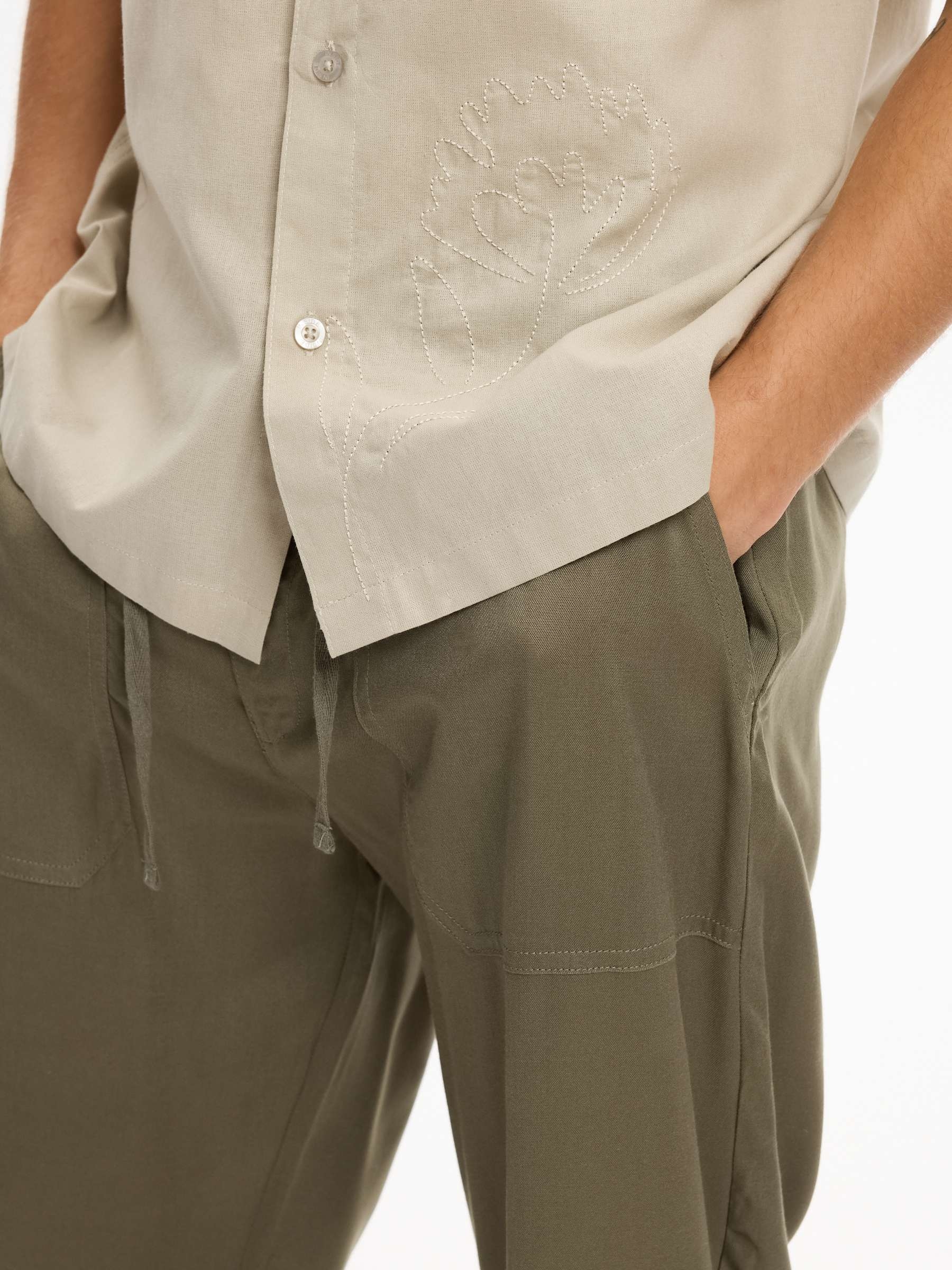 Linen joggers with elastic waistband khaki front view