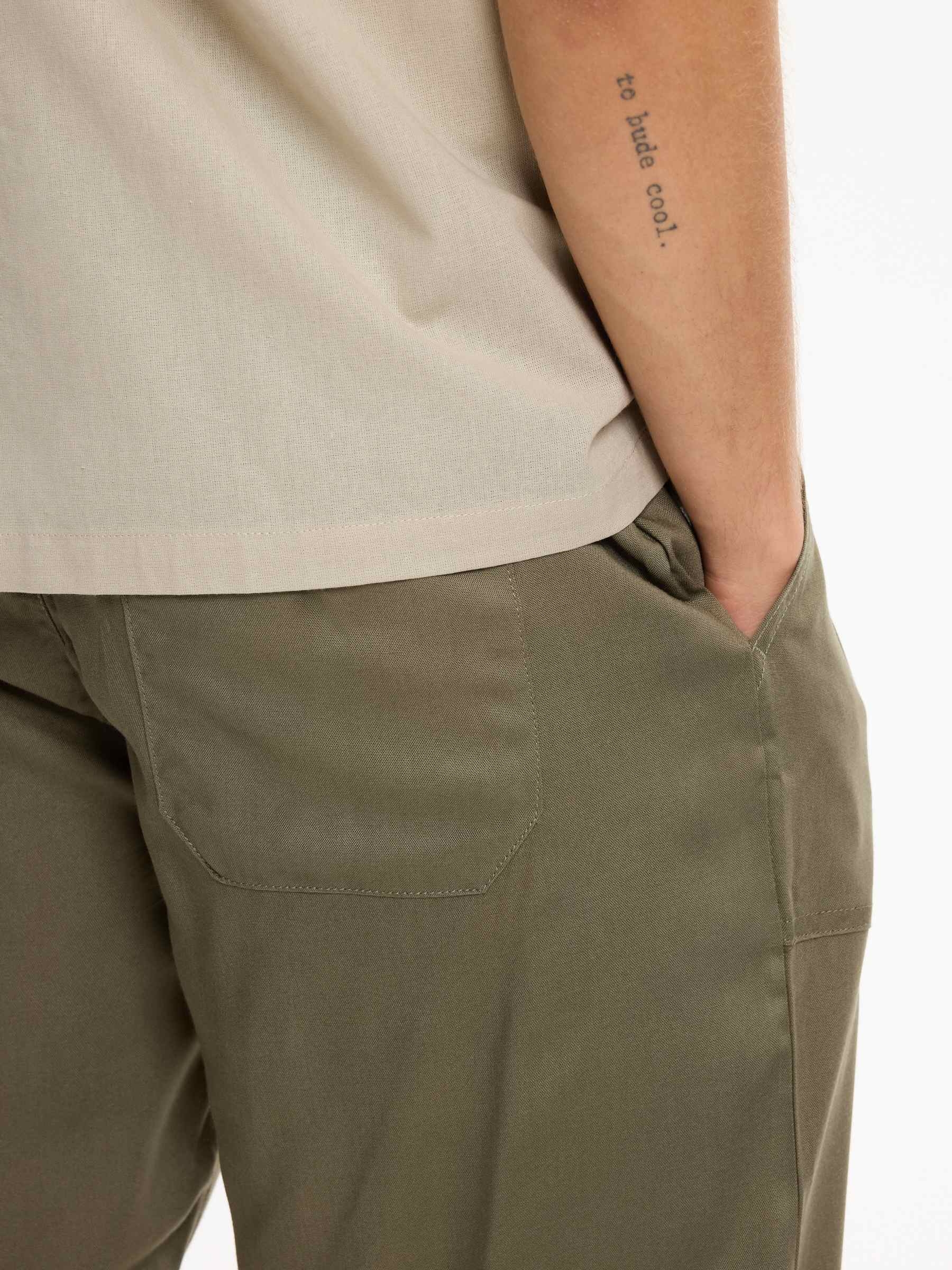 Linen joggers with elastic waistband khaki front view