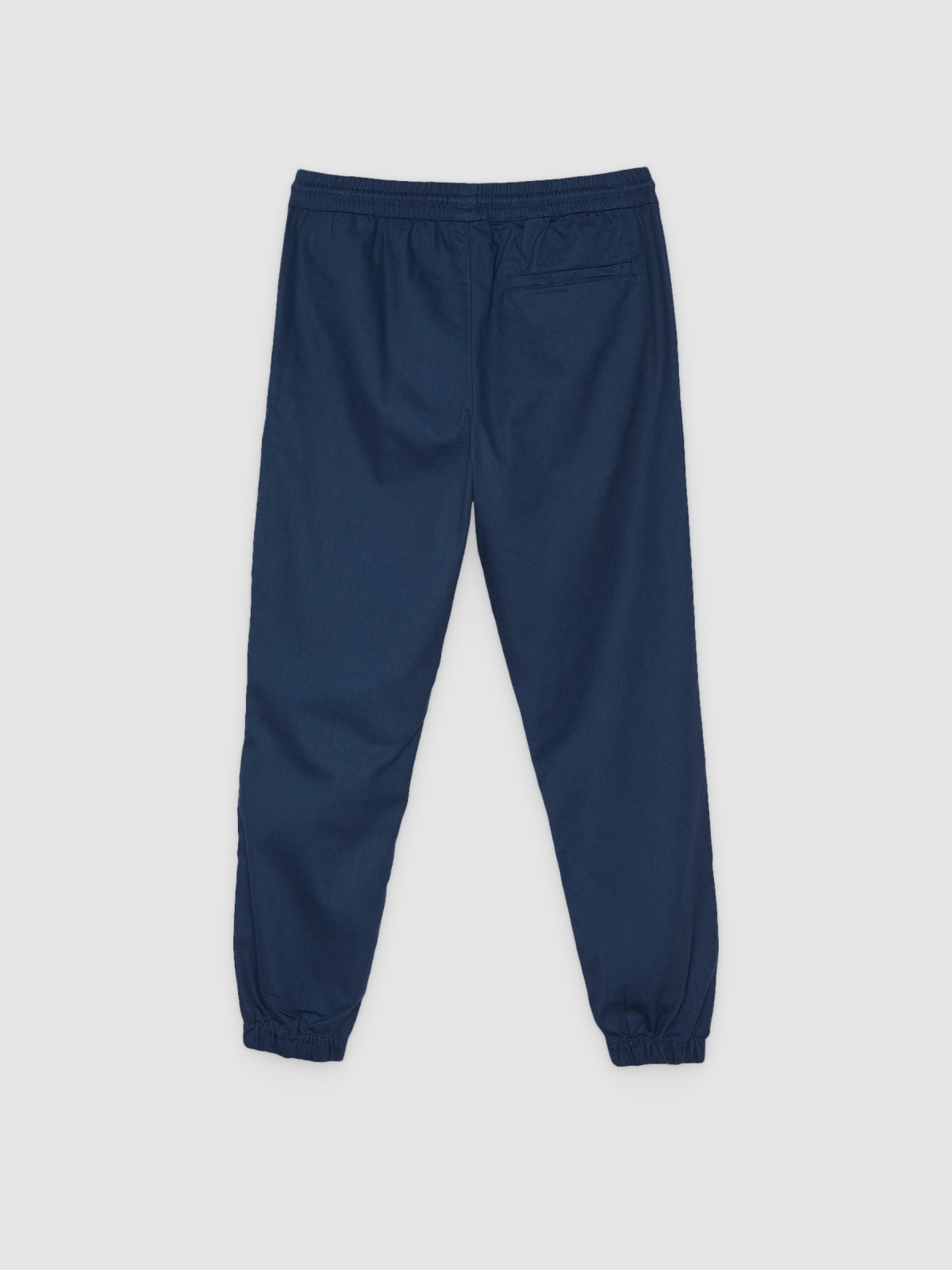 Pantalón jogger elástico azul petróleo vista trasera