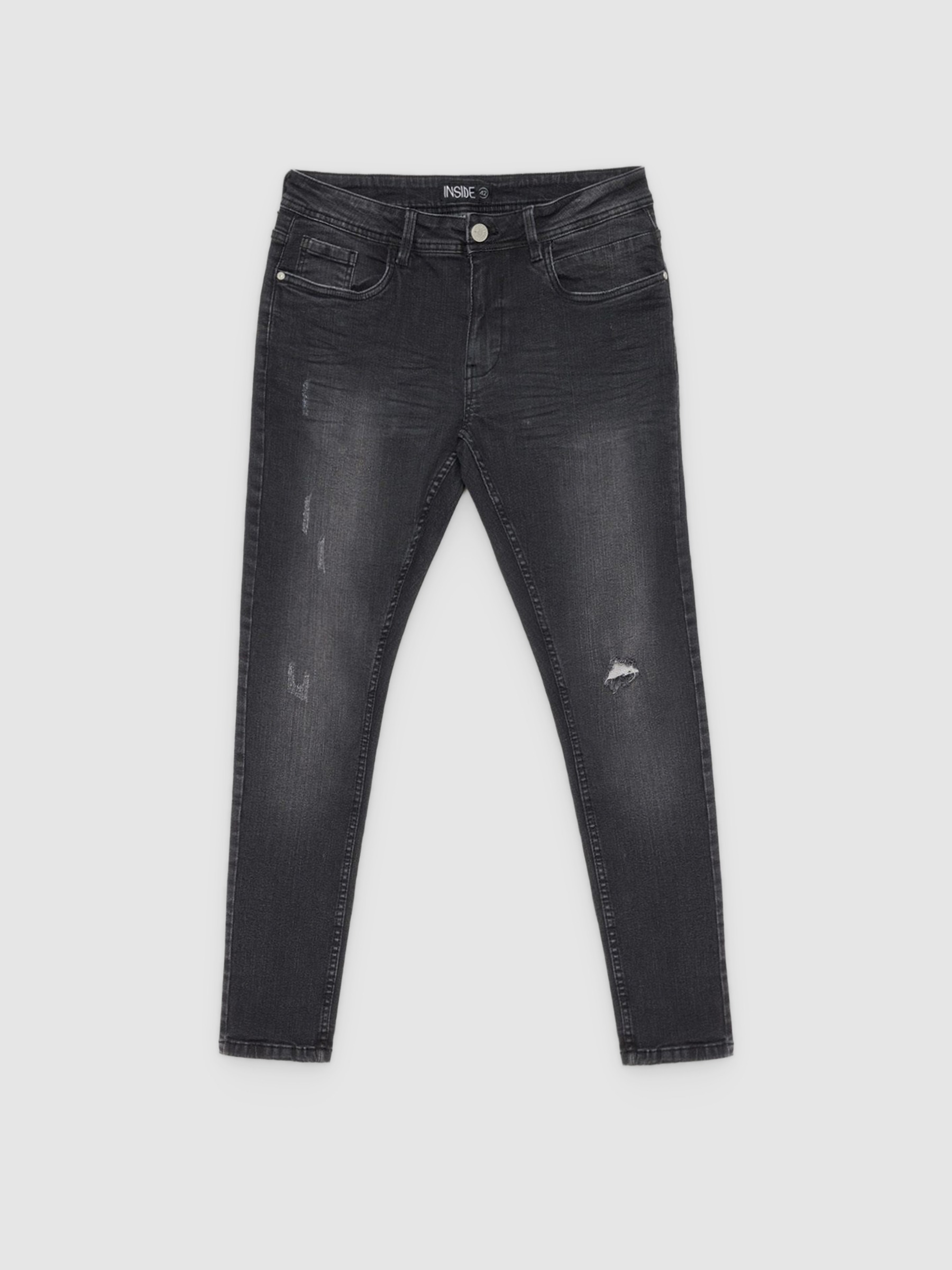 Jeans super skinny negros con roto negro vista general frontal
