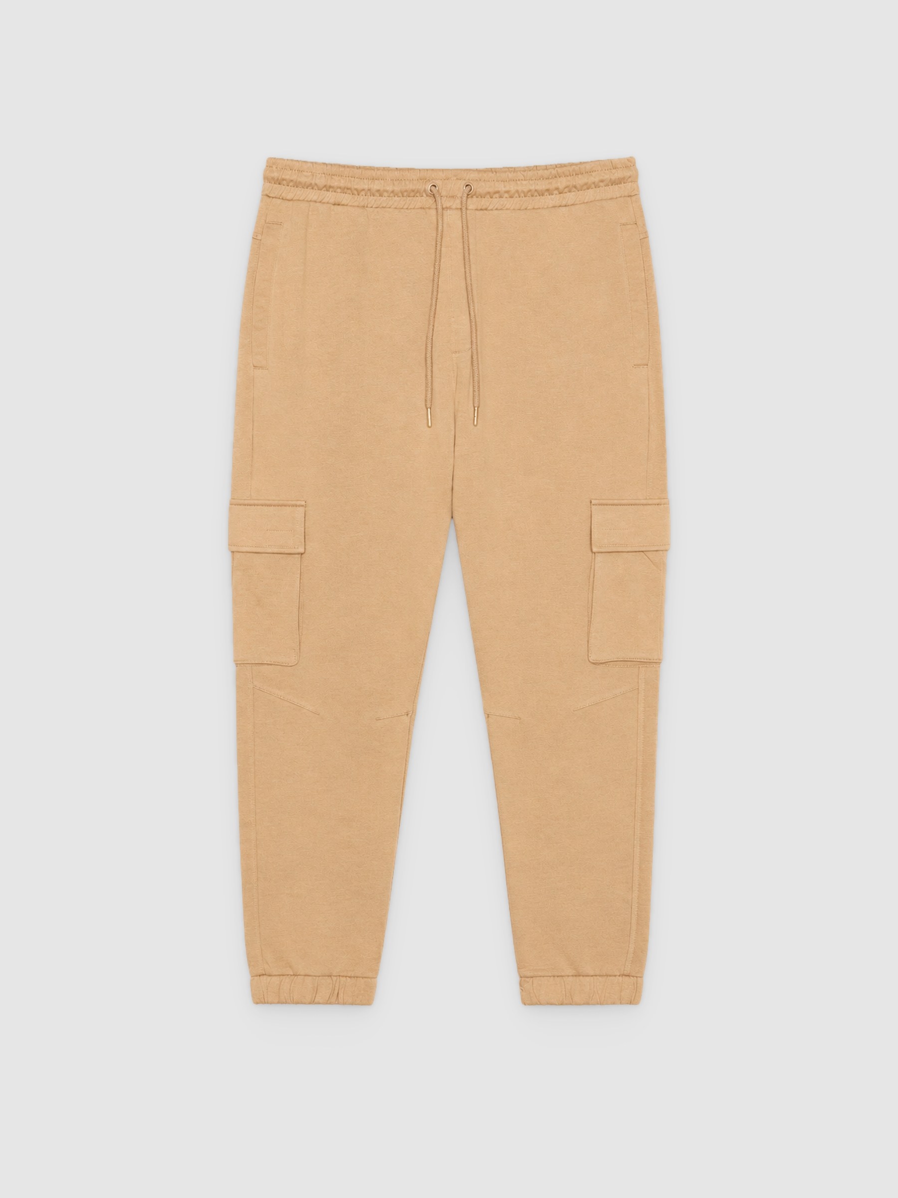 Pantalón jogger deportivo beige vista general frontal