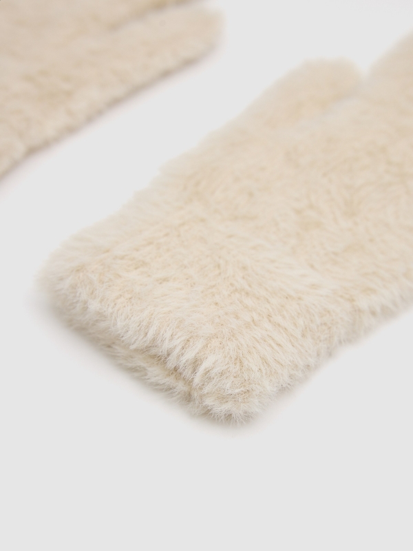 White fur gloves beige detail view