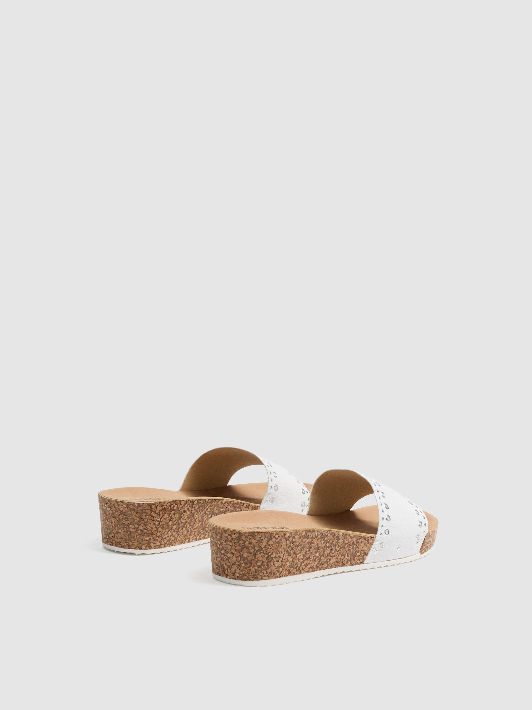 White wedge studs white