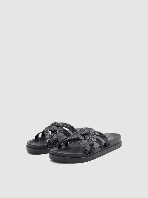 Cross-strap sandals with shiny details black 45º front view