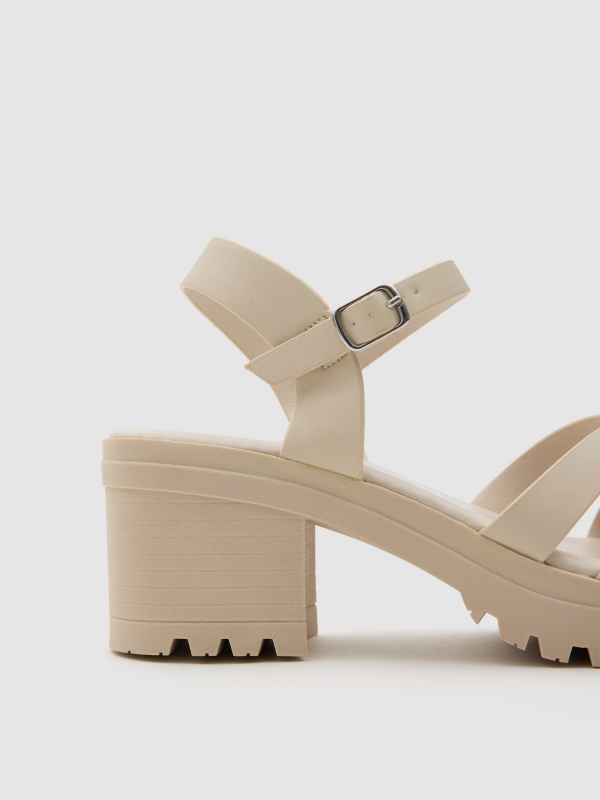 Platform sandal with crisscross straps raw detail view