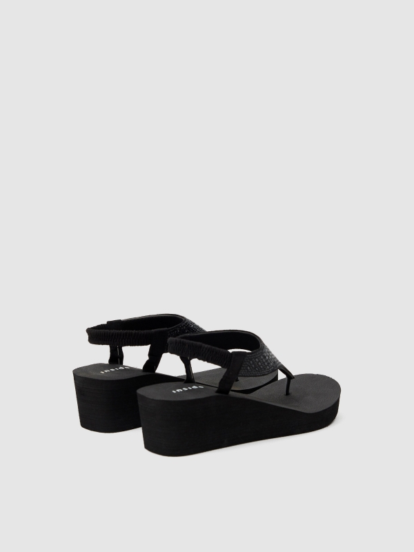 Wedge flip-flops black 45º back view