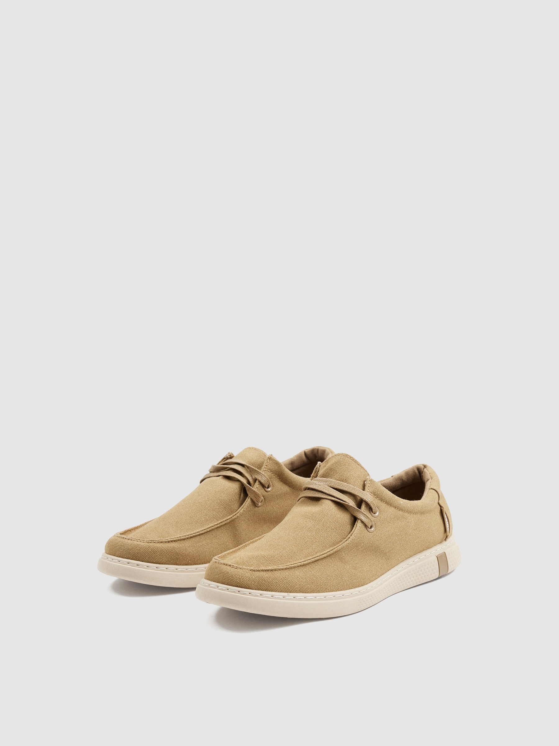 Zapato wallabee lona arena