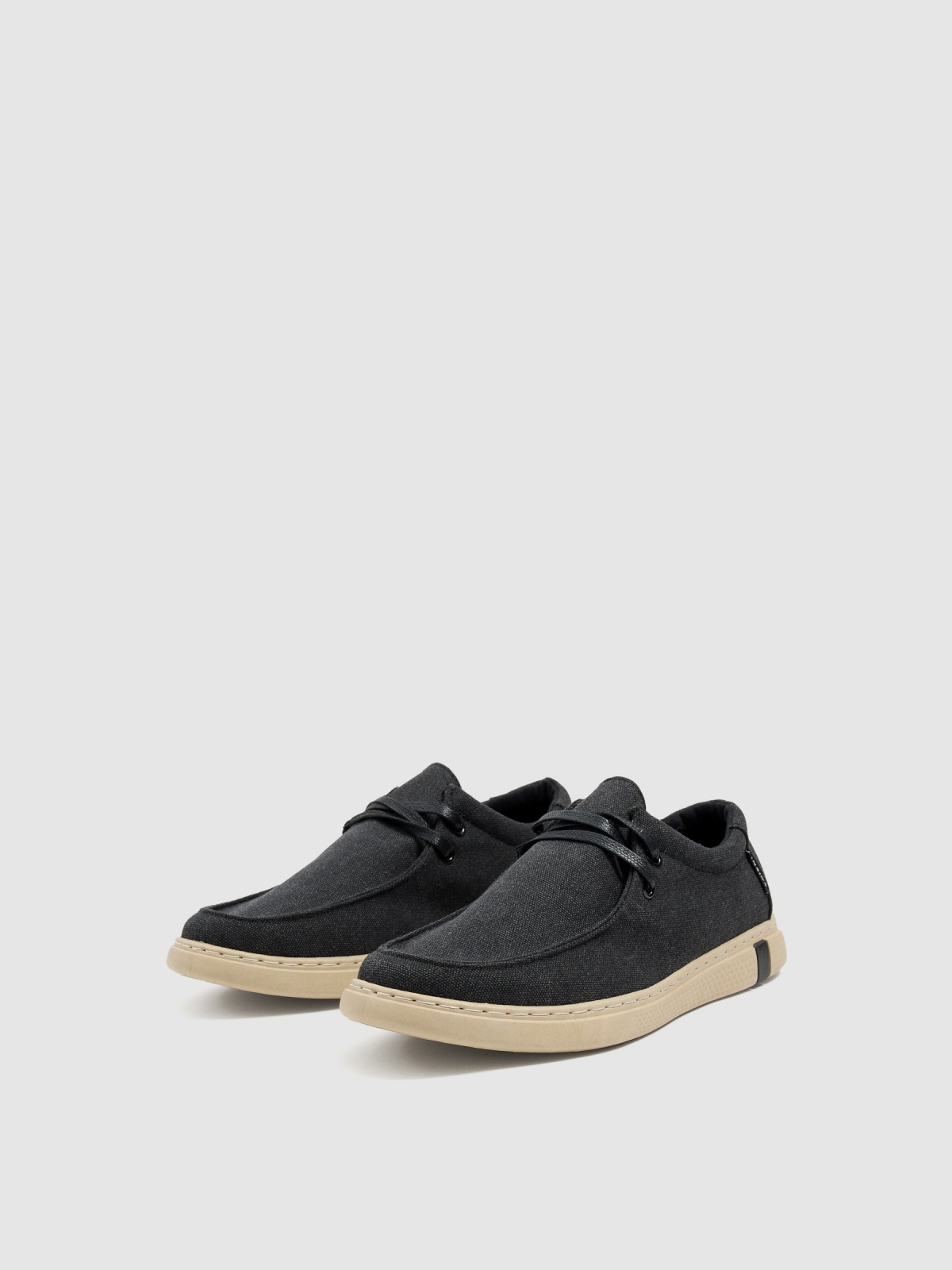 Laced wallabee shoe 45º front view
