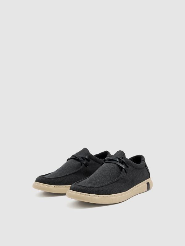 Laced wallabee shoe 45º front view