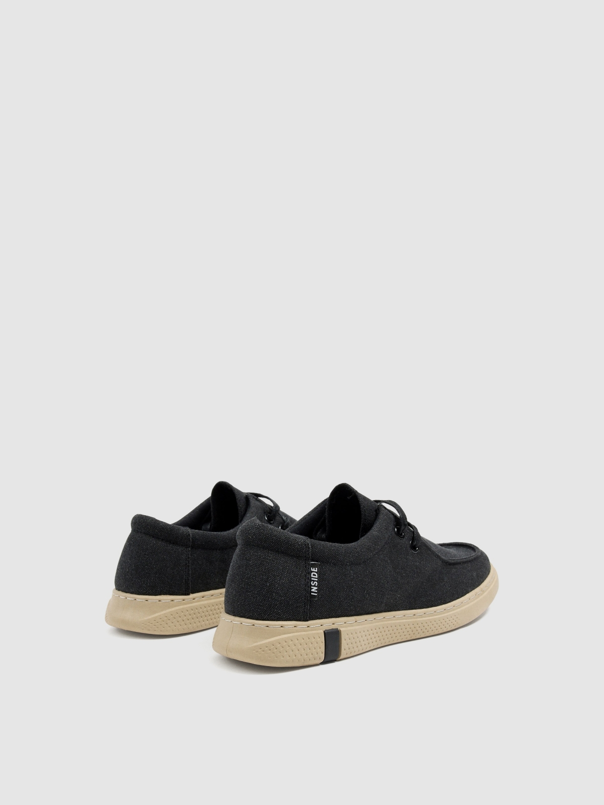 Laced wallabee shoe 45º back view