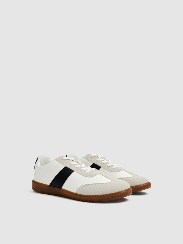 Zapatillas bajas retro blancas blanco vista frontal 45º