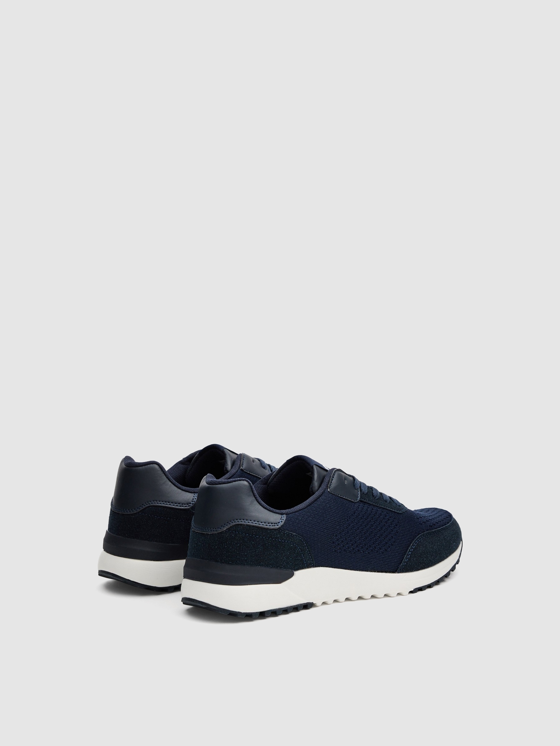 Tênis casual de corrida azul escuro azul escuro vista perfil