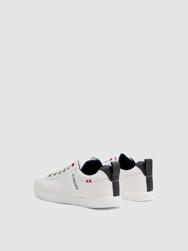 Zapatillas lona blancas blanco vista trasera 45º