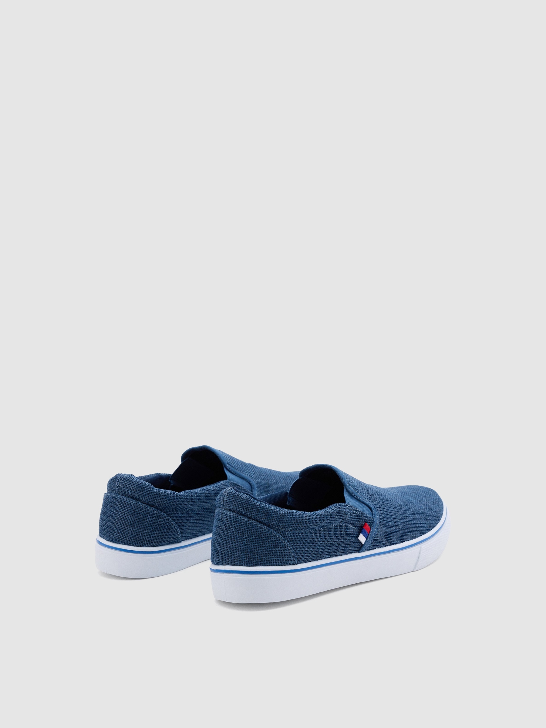 Zapatilla lona azul elásticos azul añil vista perfil
