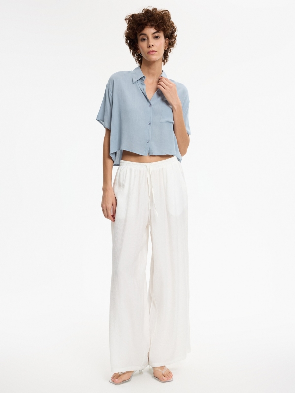 Fluid wide-leg pants beige front view