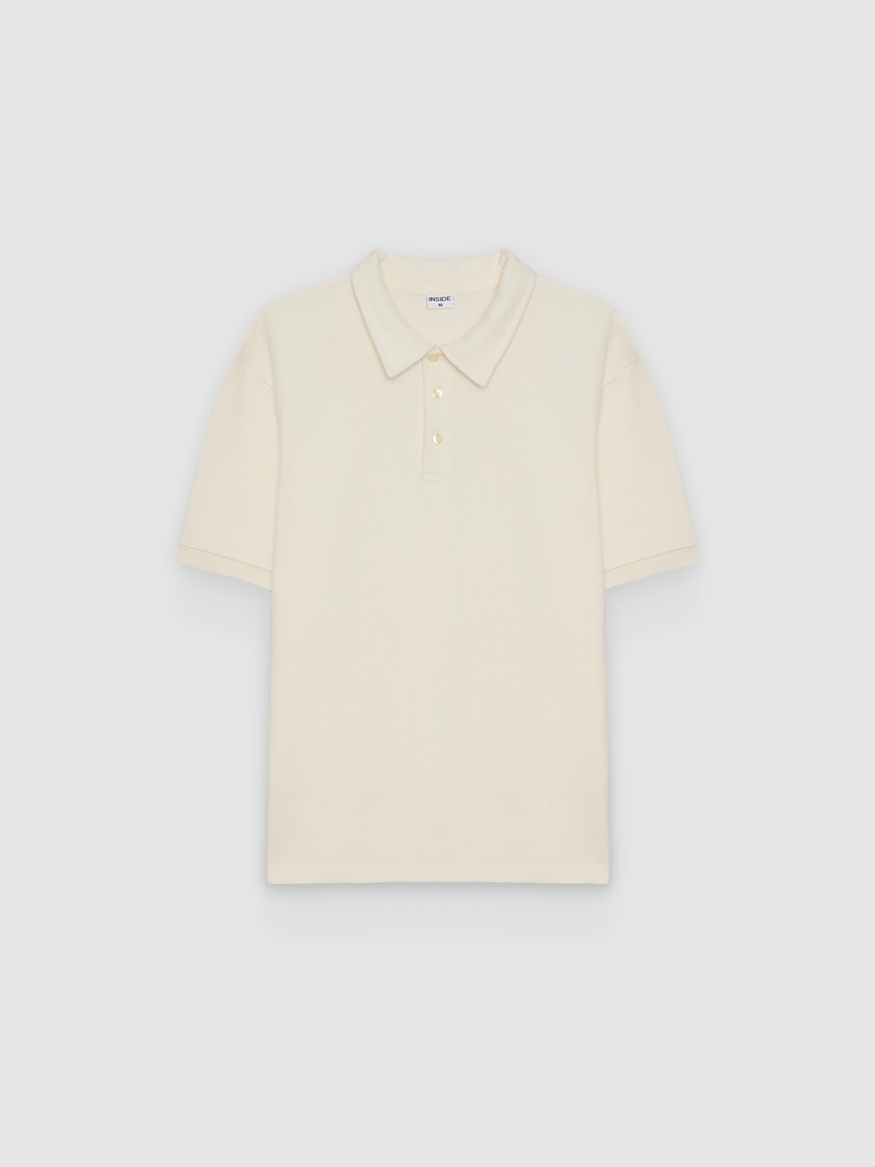  Polo liso de manga corta crudo vista frontal