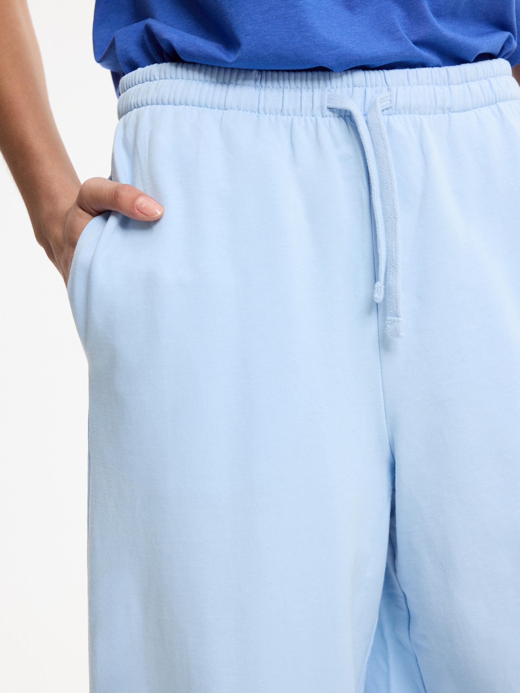 Pantalón chándal felpa liso tiro alto