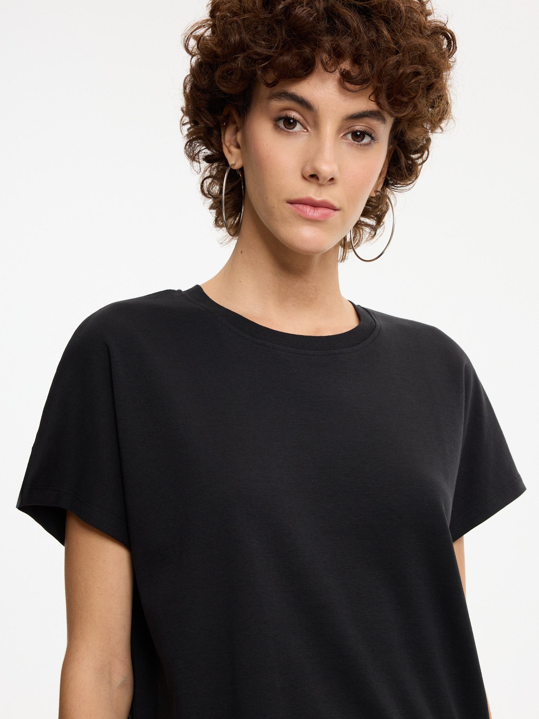 Camiseta oversize sin mangas negro vista media frontal