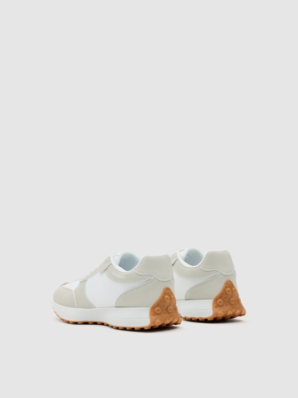 Nylon and rubber running shoes white 45º back view