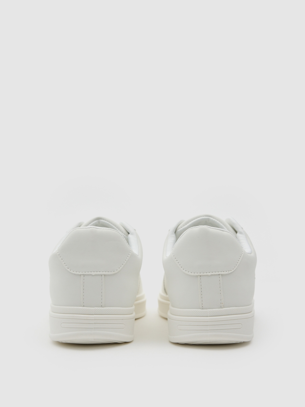 White faux leather casual sneaker white detail view