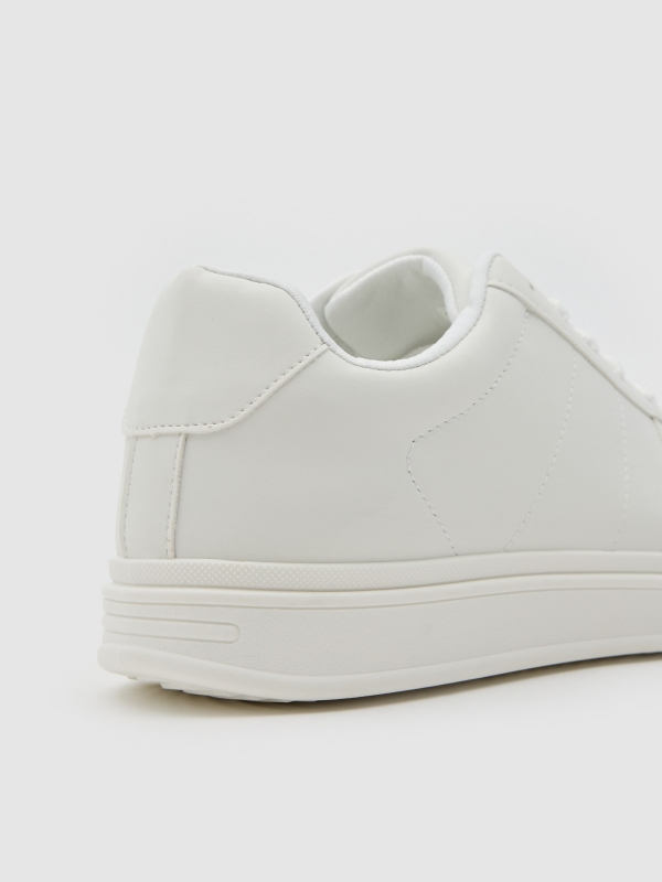 White faux leather casual sneaker white detail view