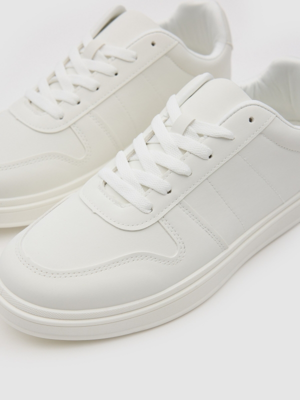 White faux leather casual sneaker white detail view