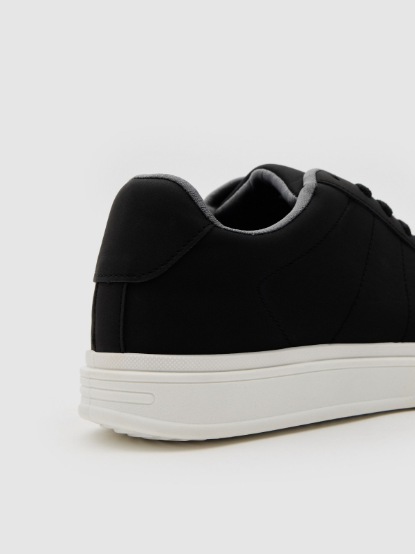 Casual black faux leather sneaker black detail view