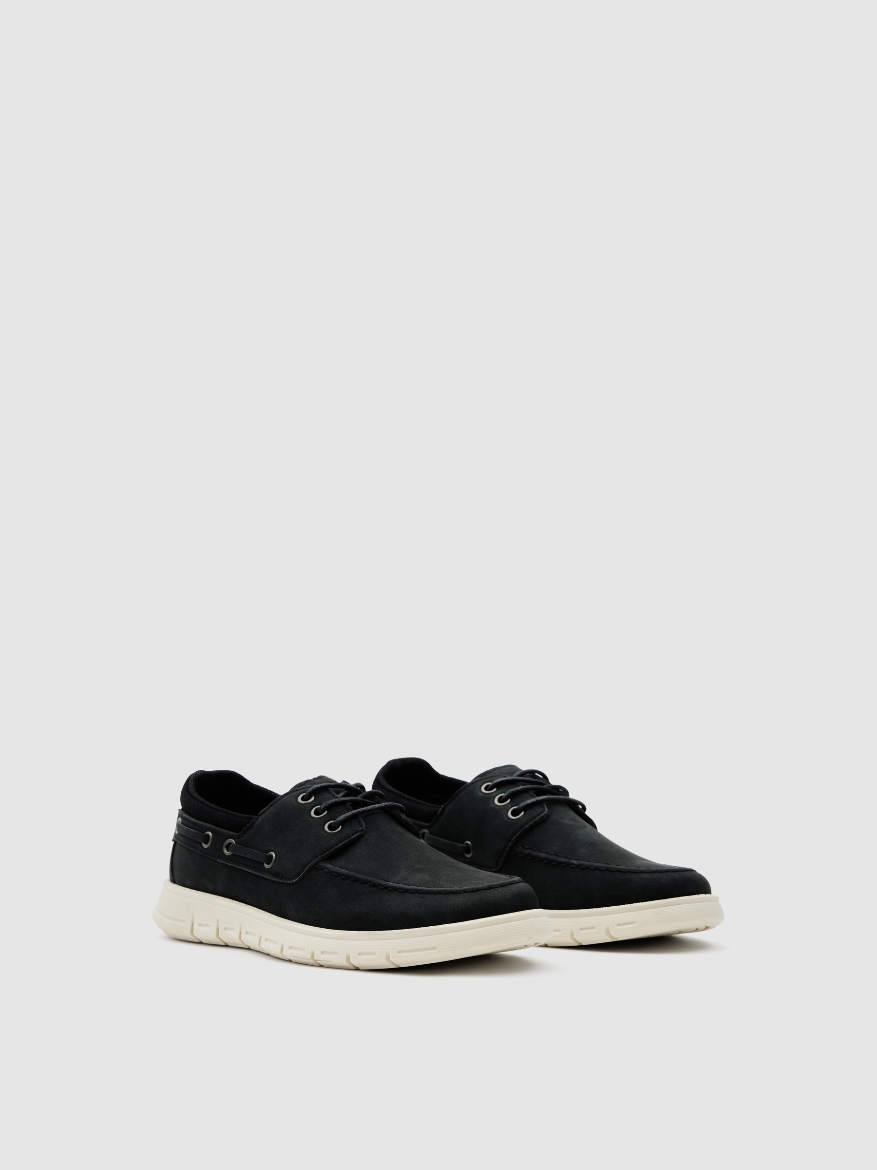 Boat shoe made of faux leather with rubber sole black