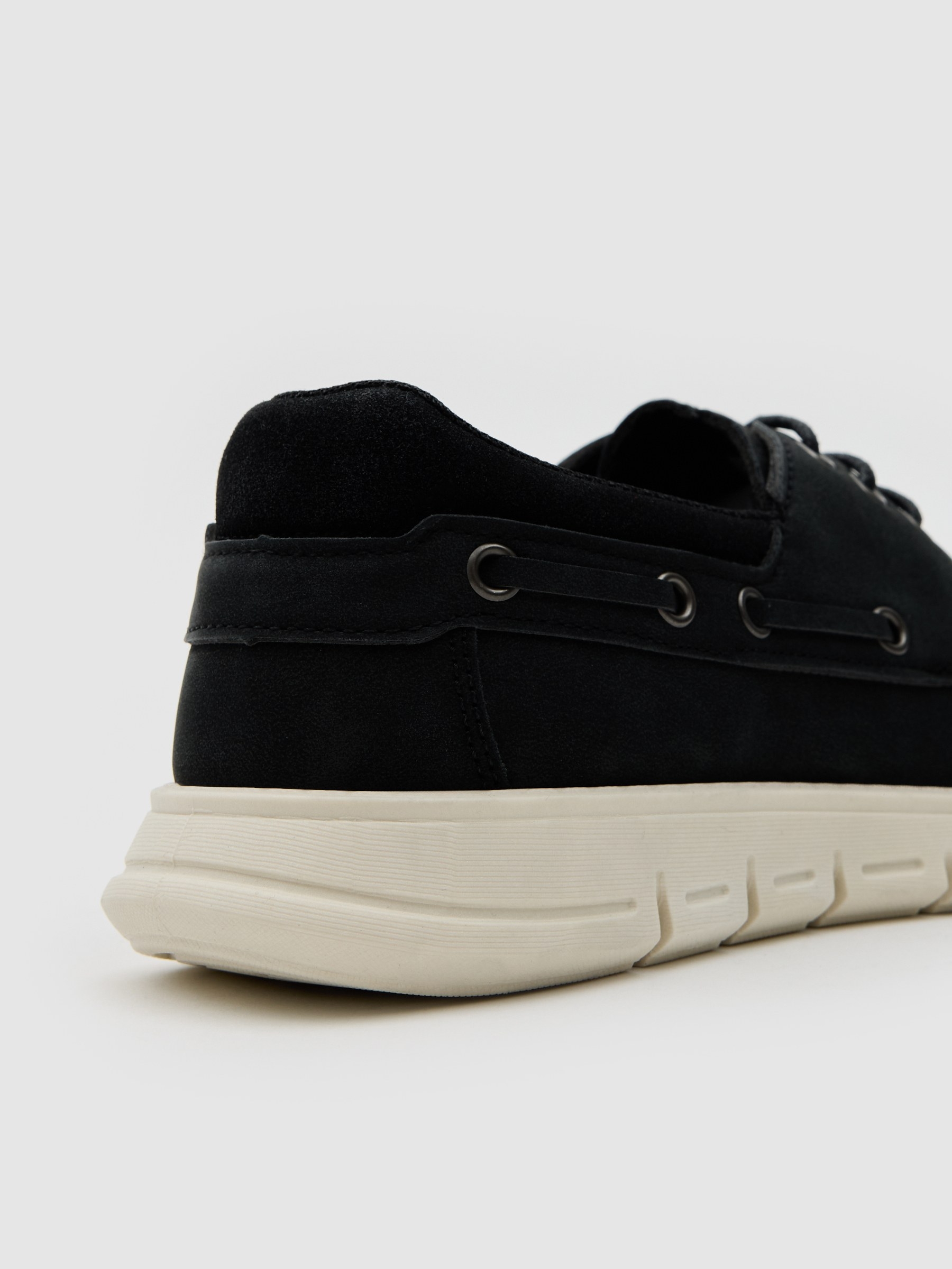Boat shoe made of faux leather with rubber sole black