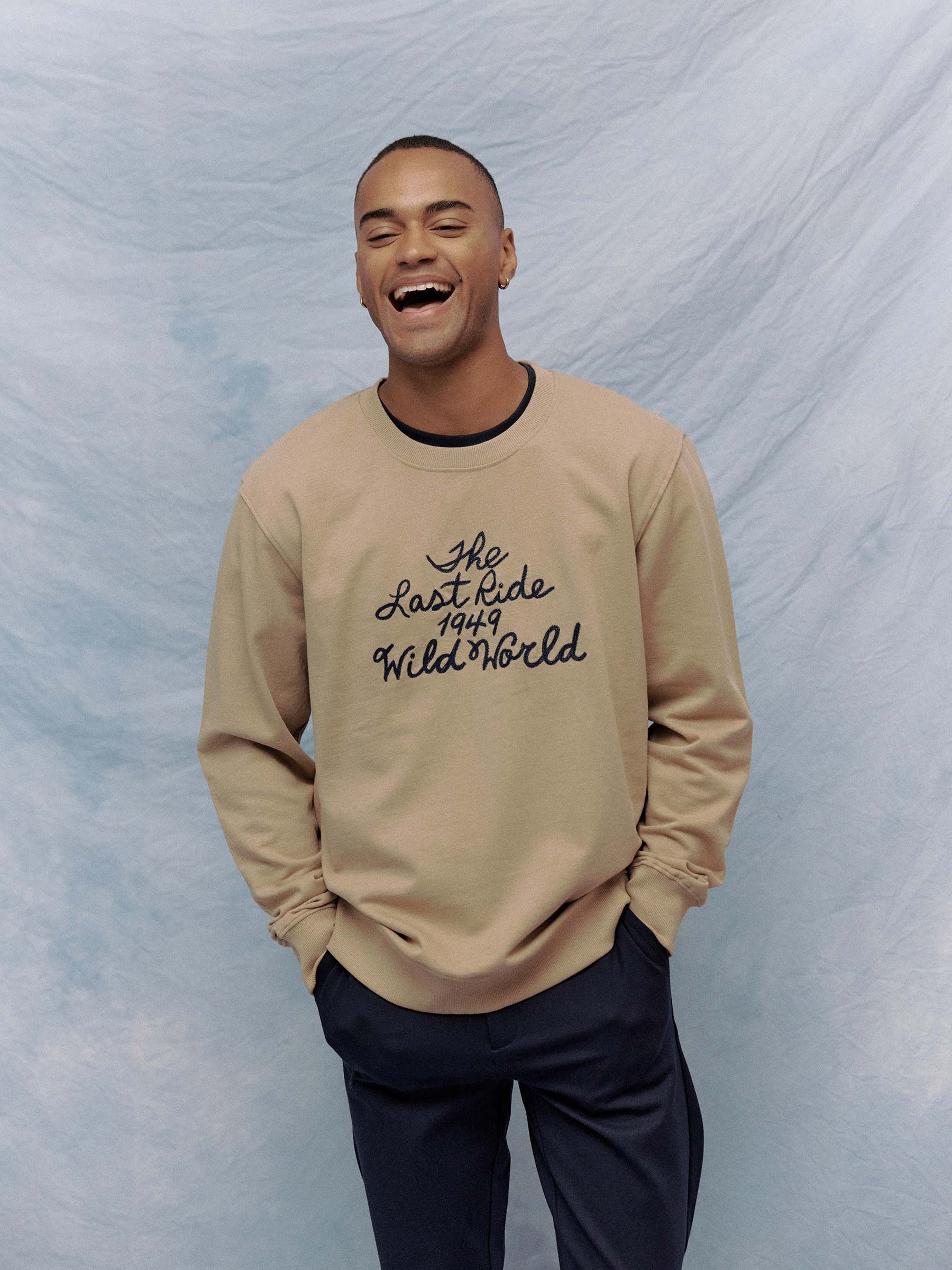 Oversized sweatshirt with embroidered text beige middle front view