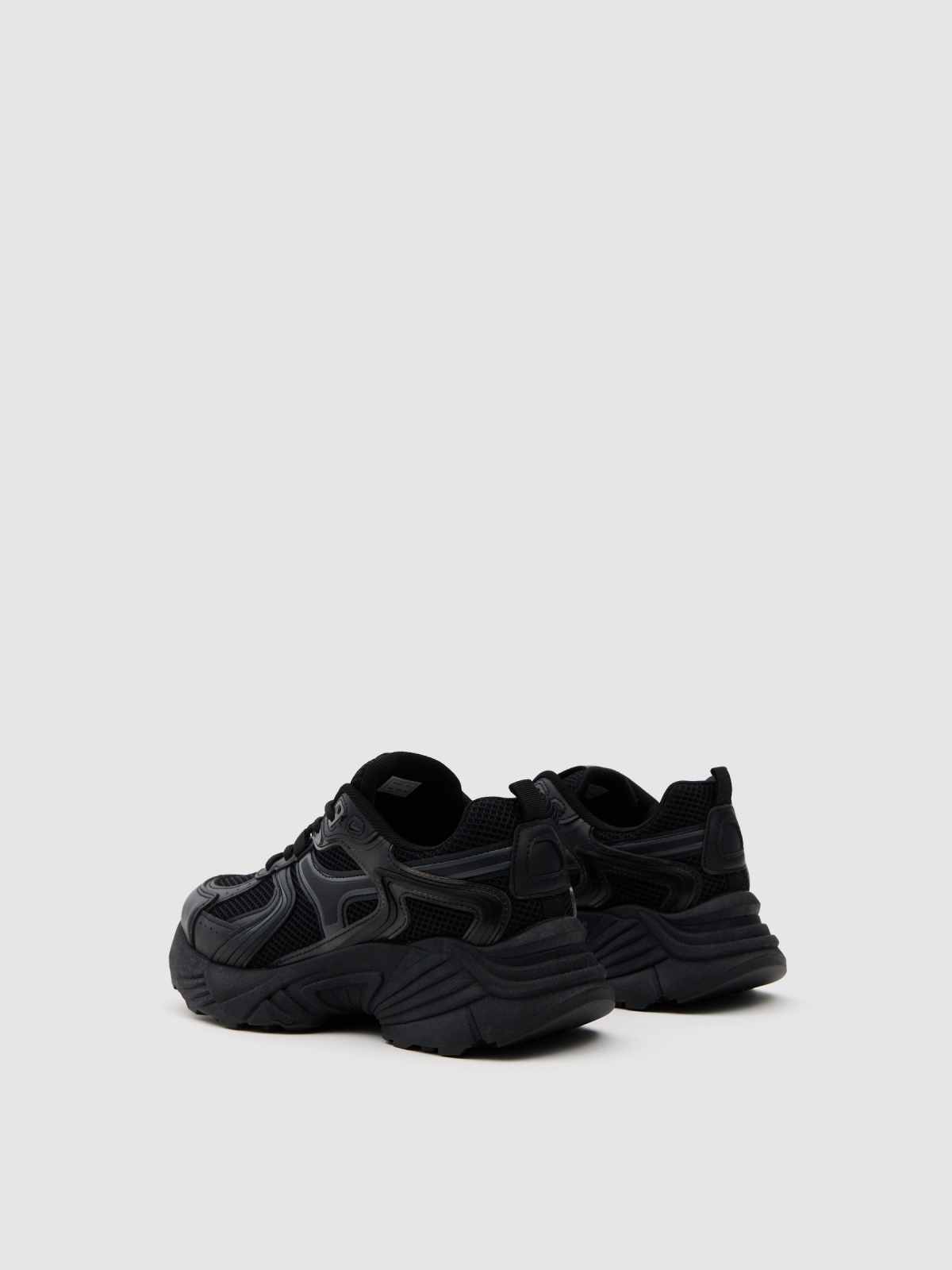 Deportiva casual running nylon negro vista trasera 45º